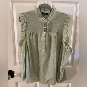 Green, sleeveless smocked top with ruffle collar. J Crew 18